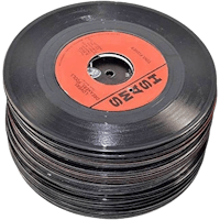 a stack of black vinyl records on a black background